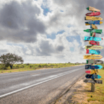 Stacked wooden signposts pointing in multiple directions — symbolizing clear options, direction, and the best vision clarity process for churches.